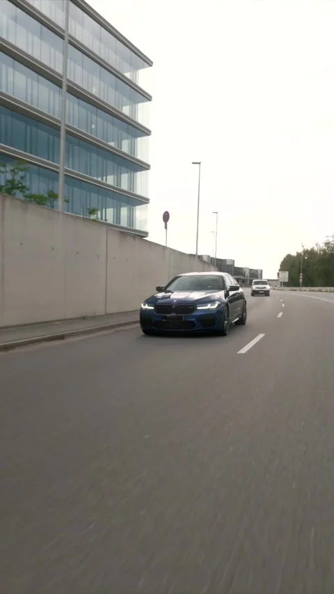 BMW M5 Rolling Shot – Front Lane Switch (Editorial) Stock Footage 309455203