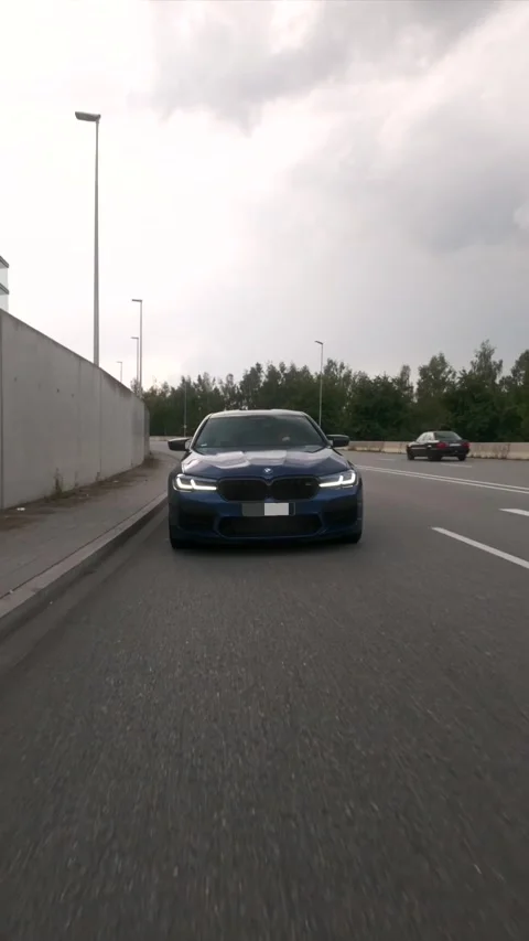 BMW M5 Rolling Shots – Parking Blurred (Editorial) Stock Footage 309455259