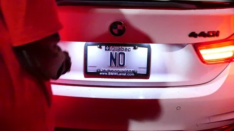 BMW with "NO" immatriculation in crowd Stock Footage 114805870