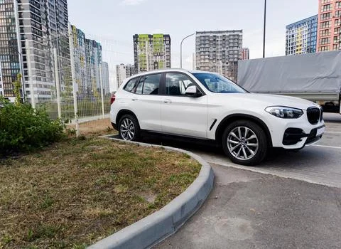 BMW on parking lot Stock Photos