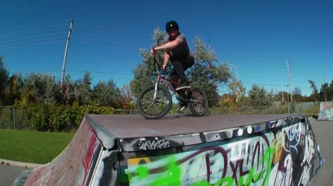 Bmx 180 barspin half cab Stock Footage 51702616