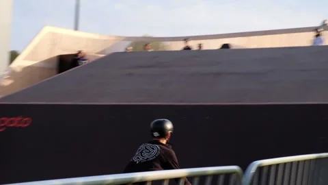 BMX athlete doing tricks on a jump in slow motion on his bicycle. Slow motion Stock Footage 161265117