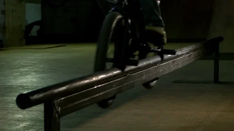BMX Athlete Doing Tricks in underground skatebord park Stock Footage 86174035