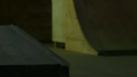 BMX Athlete Doing Tricks in underground skatebord park Stock Footage 86175412