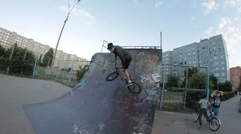 BMX bicycle trick 540 skate park Stock Footage 51542425
