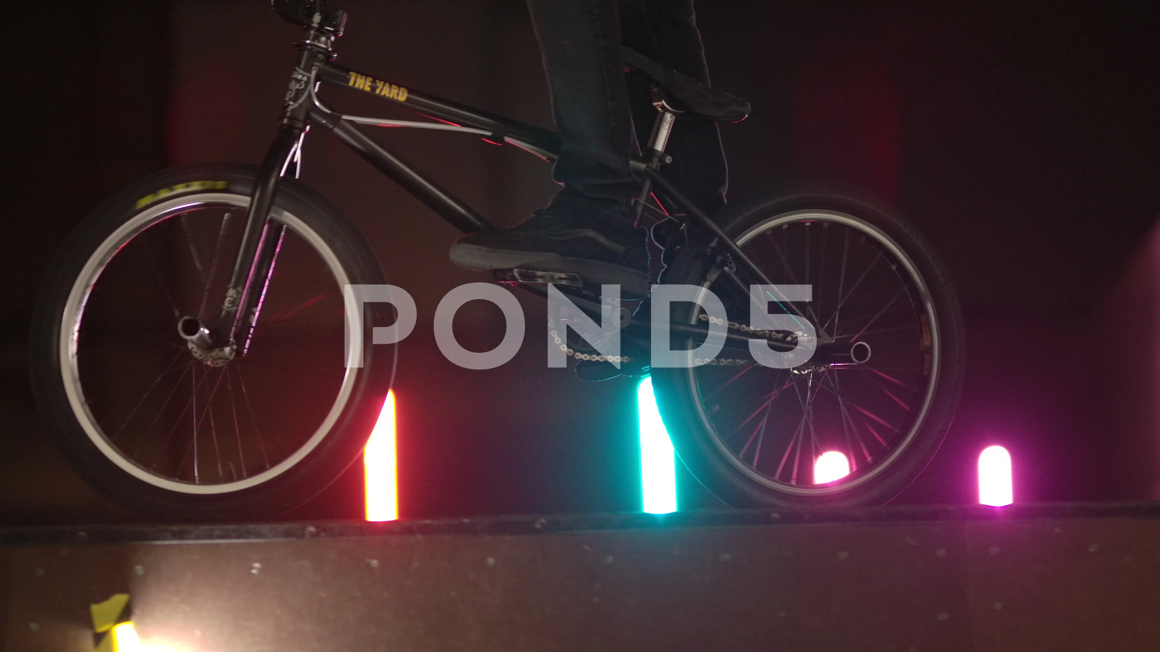 BMX bike in a skatepark with low lights 
