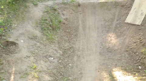 Bmx biker riding in forest Stock Footage 65311215