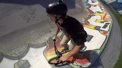Bmx extreme head mount 360 barspin trick Stock Footage 55372198