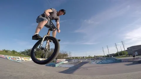 Bmx footjam tailwhip over camera neat angle Stock Footage 55357935