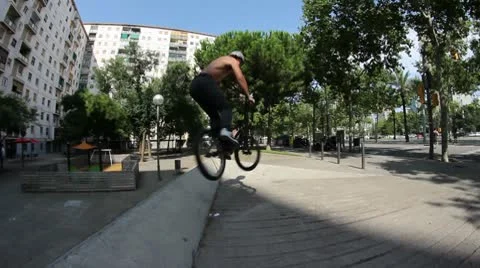 Bmx hard fall on pavement while doing a 540 Stock Footage 8960016