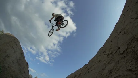 BMX low angle 360 jump on dirtjump Video stock 94287121