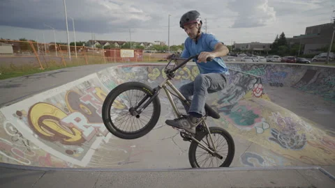BMX peg stall to fakie backwards riding Stock Video Pond5