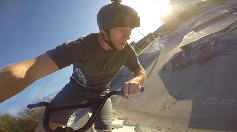 Bmx rad head mount tailwhip jump Stock Footage 55360090