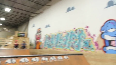 BMX rider does tricks on ramp at skate park Stock Footage 72904704
