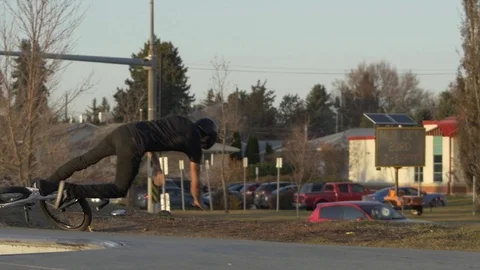 BMX rider falling while attempting 720 jump Stock Footage 119983588