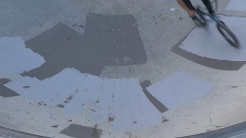 A bmx rider performs a wall ride trick at skate park Stock Footage 119983244