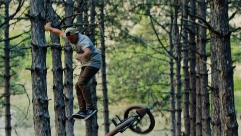 Bmx rider taking a fall while trying a double tailwhip trick Stock Footage 92167321