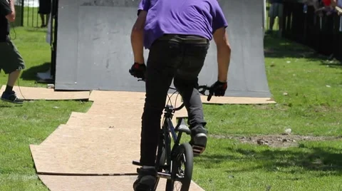 BMX riders do tricks Stock Footage 7132441