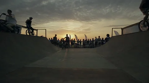 Bmx-vert in Slow Motion. athlete Makes Turns And jumps on a Bmx bike in the Stock Footage 60680766