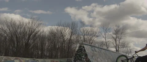 BMXer does 360 on ramp. Stock Footage 23150077