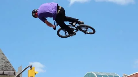 Bmx'er does a big tailwhip Stock Footage 8960048