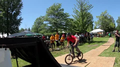 Bmx'er does a perfect flair Stock Footage 8959275