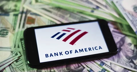 Boa Logo on iphone surrounded by $100 Bills. Bank Profits Layout. Stock Footage 169007500