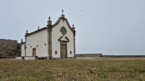 Boa Nova Chapel stands alone atop coastal rocks in Leca da Palmeira, Portugal Stock Photos