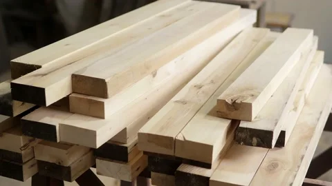 The board after processing assembled in a carpentry workshop. A carpenter in the Stock Footage 196937771