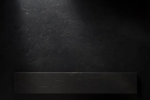 Board on black background . Stock Photos