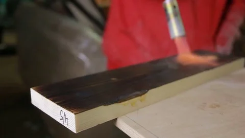 Board burning fire of a gas burner. color wenge Stock Footage 72583342