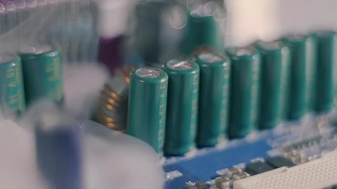 On board with capacitors, like water a smoke flows in and completely fills it Stock Footage 313160776