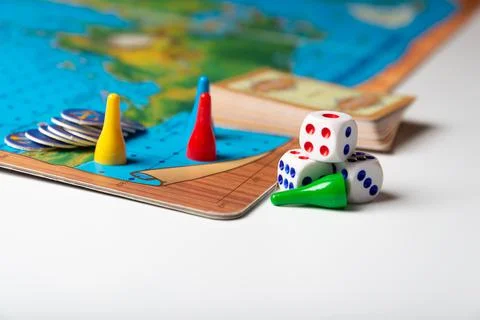 Board game with cubes and figurines, turn-based game Stock Photos