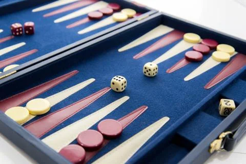 Board games - backgammon in play Stock Photos