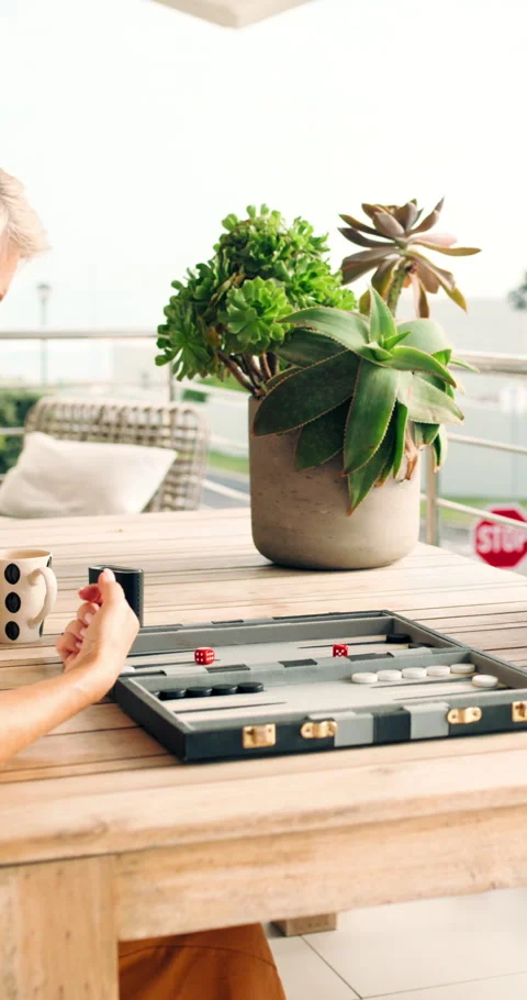 Board games, funny and playing with women in home together for bonding or Stock Footage 336737105