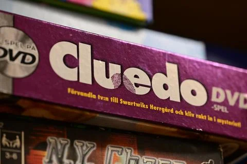 Board games for sale in a second hand shop. Cluedo. Stock Photos