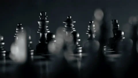 Board intelligence game - wooden chess. Close- up view of pieces on chessboard Stock Footage 164654359