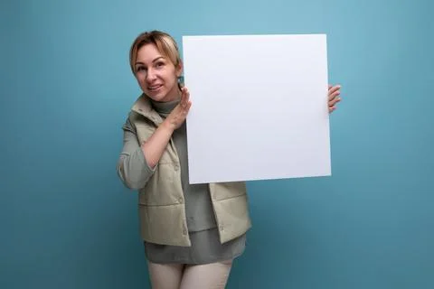 Board with a layout for the presentation of the product at work in the hands of Stock Photos