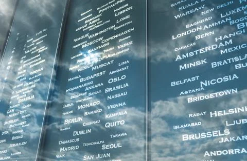 Board of list countries with a sky reflection . flight information board Stockfoto's