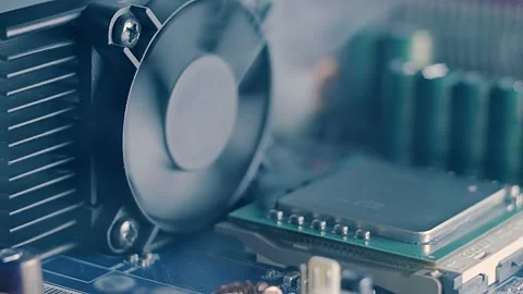 On board with processor smoke appears and is sucked in by the fan Stock Footage 313145727