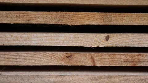 The board is ready for use. Tree after sawmills. Wooden material for the floor. Stock Footage 218351042