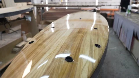 Board surf Board in the workshop varnished Stock Footage 132347019