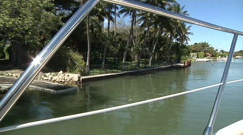 On board view of a boat slowly navigating in Miami Stock Footage 68457990