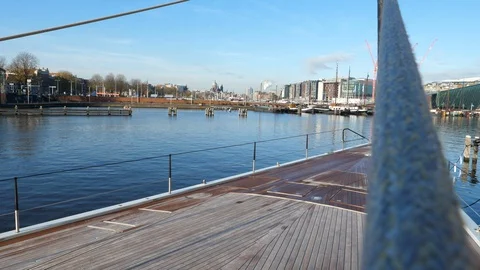 On board view of the bow of Baltic 142 sailing boat docked in Amsterdam. Stock Footage 128417043