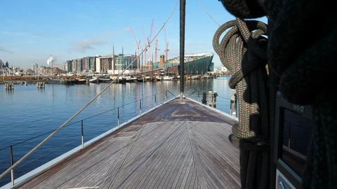 On board view of the bow of Baltic 142 sailing boat docked in Amsterdam. Stock Footage 128417240