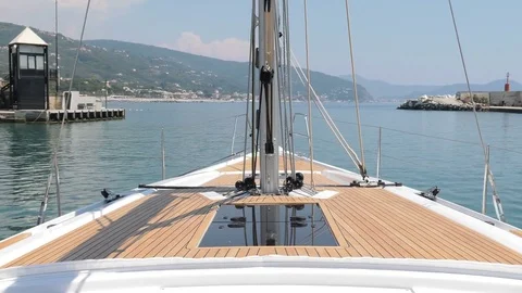 On board view of a sailing boat leaving port Stock Footage 71832936