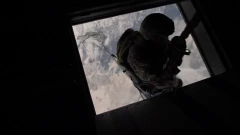 On-board view soldier fast-roping from CH-53 Super Stallion Stock Footage 271234058