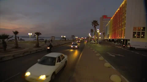 Board walk with traffic Tel Aviv Pan Righ to Left Night2 Stock Footage 25136578