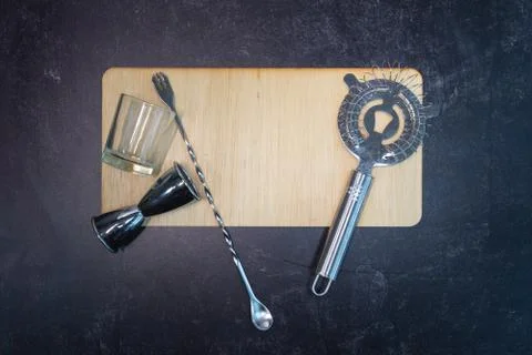 Board without writing bartender equipment shot glass alcohol measurer flat lay Stock Photos