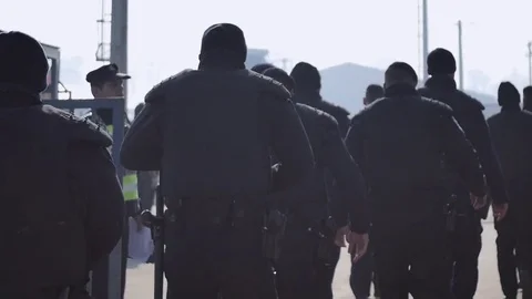 Boarde lockdown Police Army squad Exodus Quarantine pandemic coronavirus Stock Footage 73493765